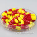 Size 0 red yellow capsules
